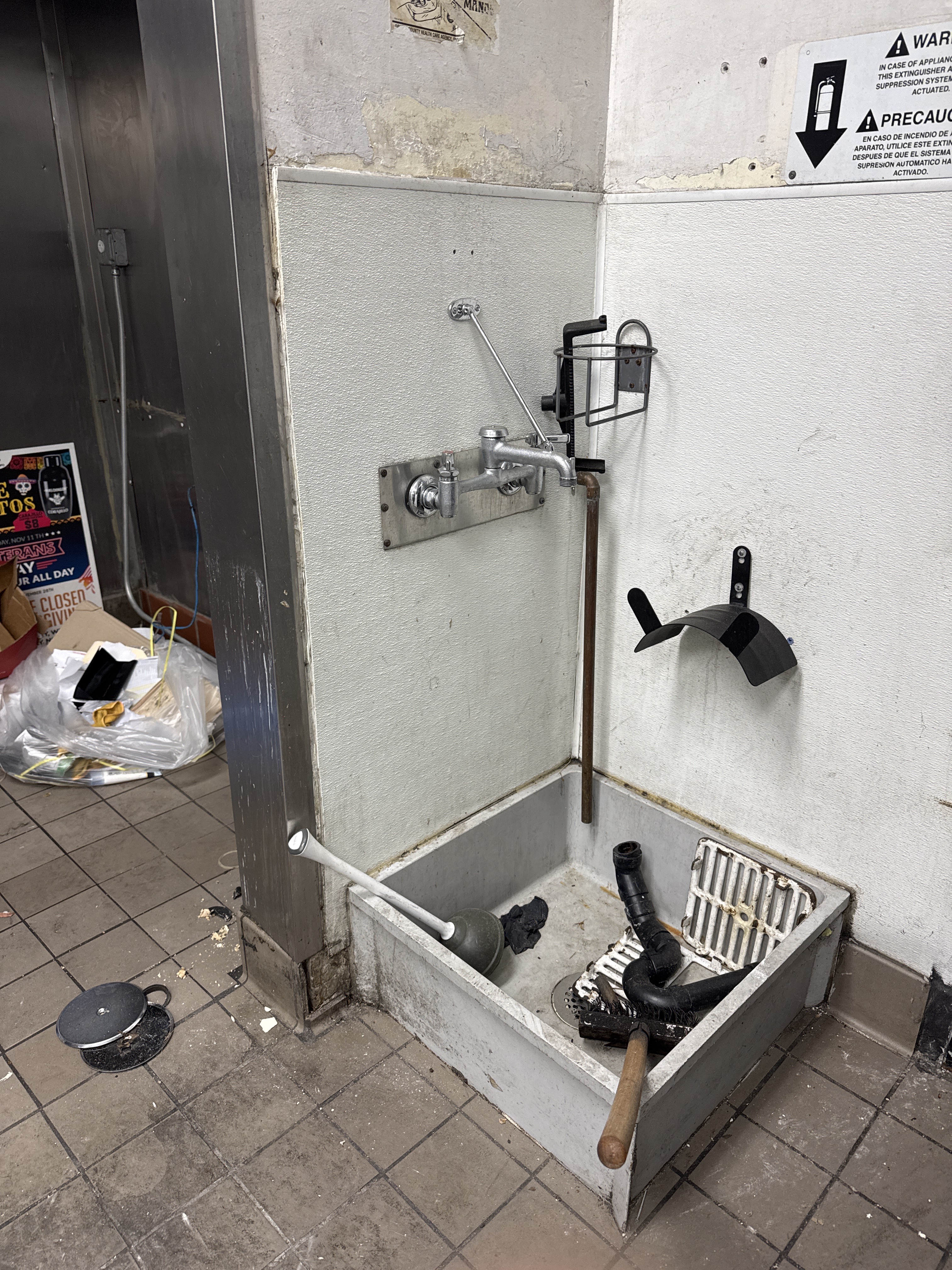 Commercial kitchen mop sink and plumbing fixtures