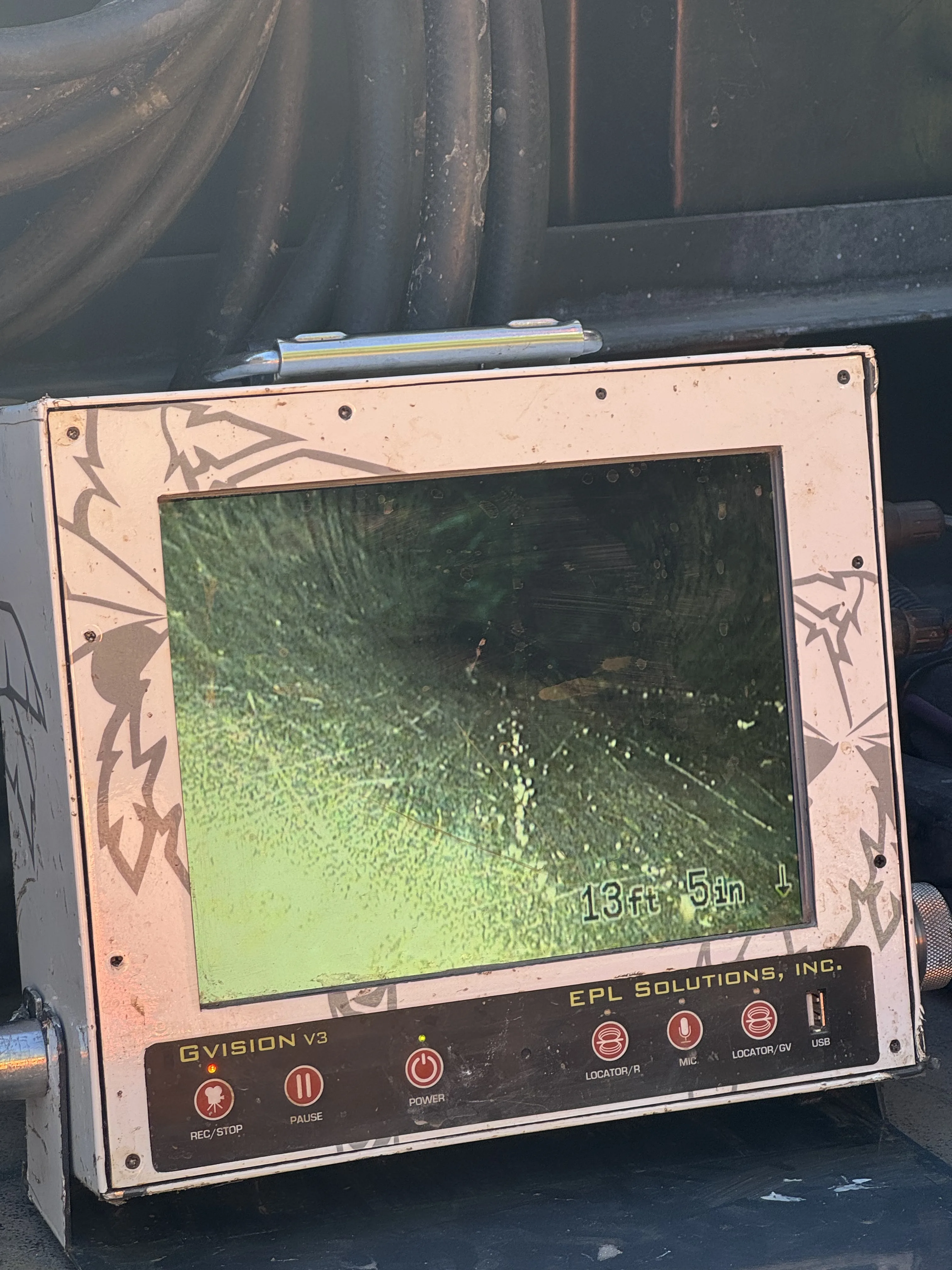 Sewer camera inspection monitor showing pipe interior