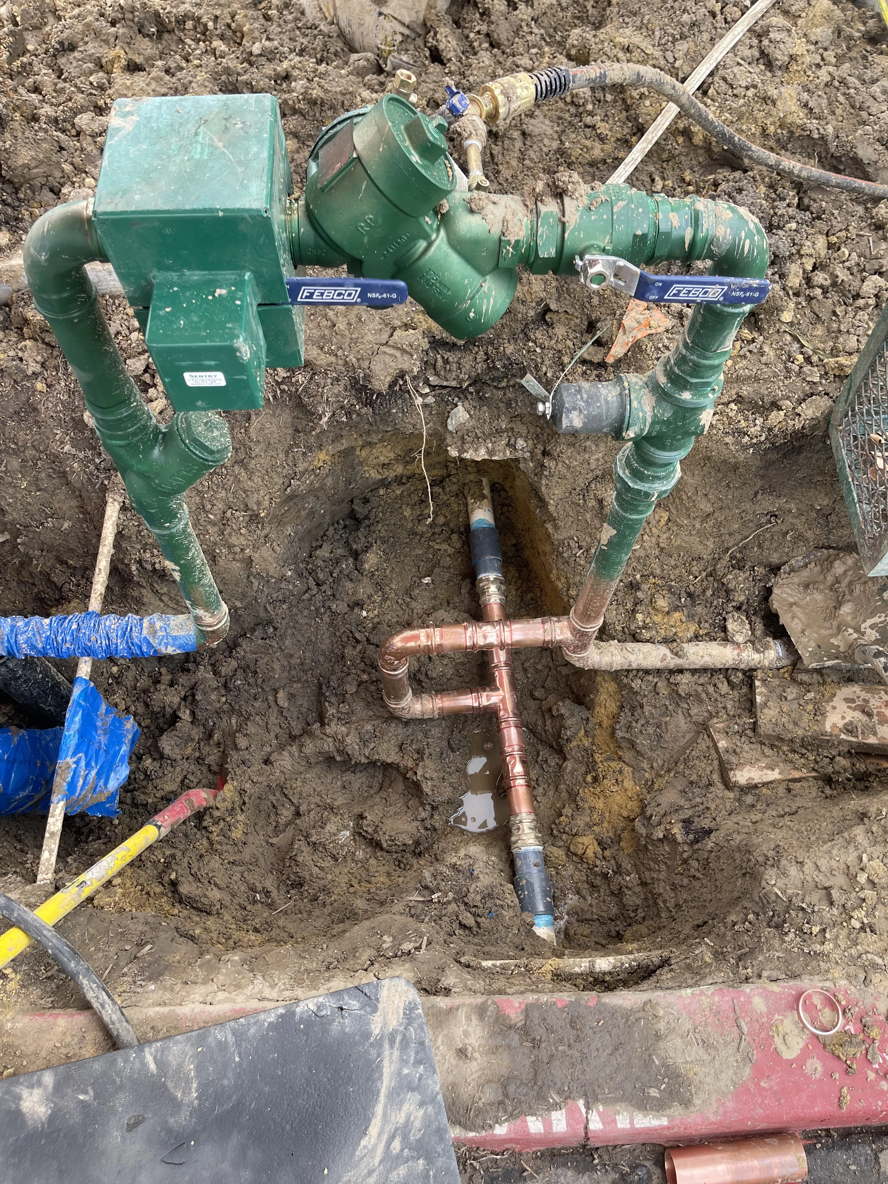 Underground backflow preventer and copper supply line installation in Riverside County