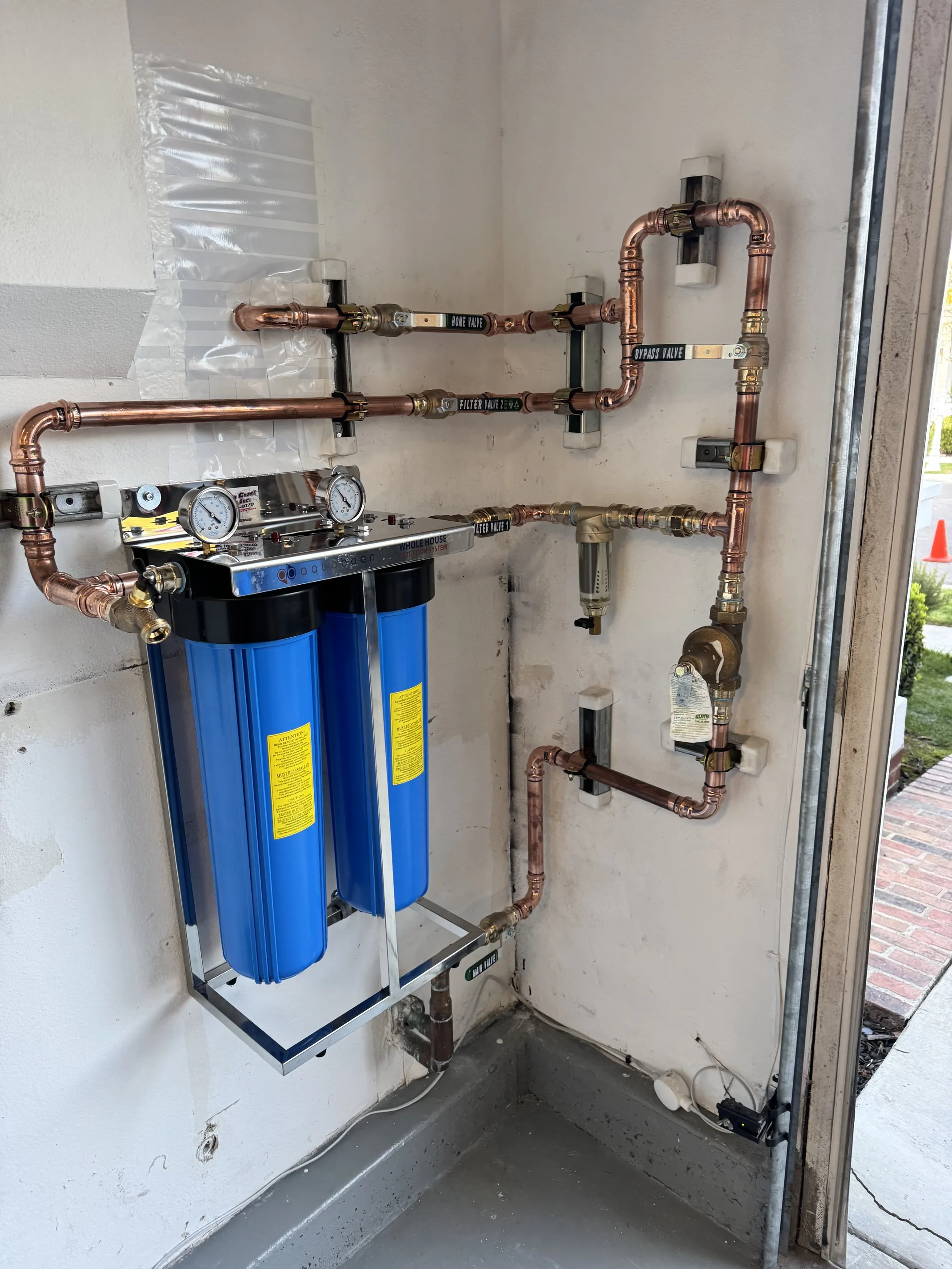 Commercial water filtration system with copper piping installed in Irvine